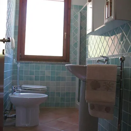 Le Domus De Chia_tipo A בית נופש *